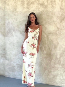 Elegant slim-fit floral A-line midi dress with spaghetti straps and vintage bow detail