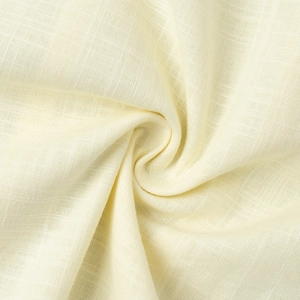 Close-up of high-quality cream lace and cotton fabric texture with a soft drape