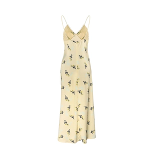 Détail de la robe midi en satin fleuri avec bordure en dentelle blanche et dos en V