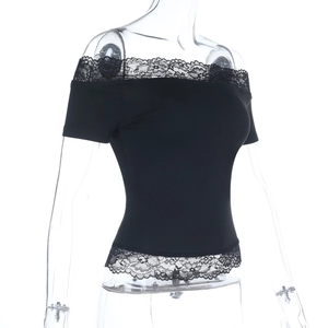 Close-up of elegant black lace trim on an off-shoulder slim fit top for women