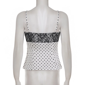 Detailed back view of white polka dot satin camisole with black floral lace trim