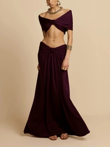 Deep plum off-shoulder twist crop top and matching long pleated skirt set for women