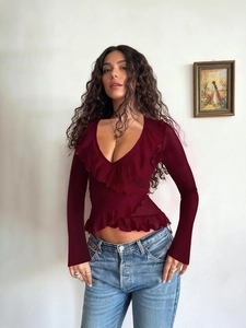 Elegant wine red wrap top with ruffled long sleeves and a V-neckline in vintage style