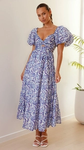 Detail of blue floral print V-neck dress with puffy sleeves and waist cutout design