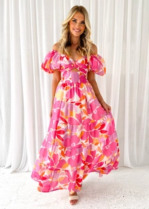 Detail of colorful floral print dress with strapless neckline and cutout knot design