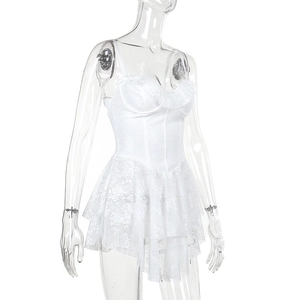 Close-up of white floral lace tube top dress with tiered skirt and underwire detail