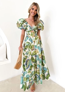 Close-up of lightweight floral fabric layers and tiered hem on this summer dress