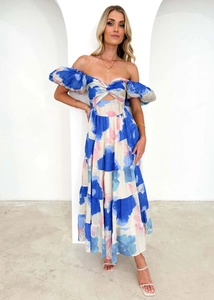 Macro shot of abstract blue floral print and waist twist knot on the summer maxi dress
