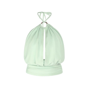 Detail of mint green halter top featuring a tortoise shell ring and deep V-neckline