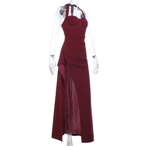 Detail of burgundy tube dress with elegant side pleats and a sexy high slit design