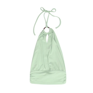 Detail view of light green halter top featuring a ring connector and hollow droplet design