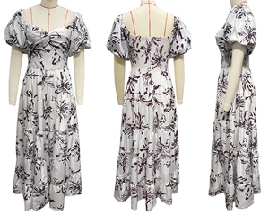 Detailed views of floral satin mini dress with puff sleeves and tiered skirt details