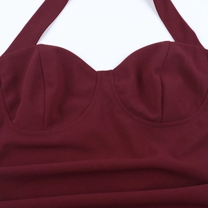 Detail of the sweetheart neckline and seam stitching on this wine red bow dress