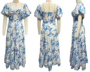 Detail view of floral A-line dress with puff sleeves and bow knot hollow design