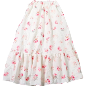 Close-up of floral print maxi skirt featuring ruffled hem and elastic waist detail