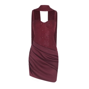 Detail of burgundy evening dress featuring sequined lace bodice and draped satin skirt