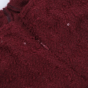Detail of wine red sequin tweed fabric featuring high-quality invisible zipper closure
