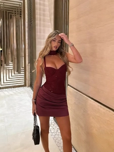 Sparkly sequin mini dress in wine red featuring a sweetheart neckline and satin bow detail