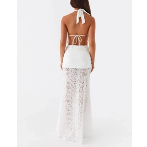 Detail of white backless dress with 3D rose lace texture and delicate back ties