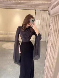 Elegant slim-fit black evening dress featuring long pleated sleeves and a high waist design