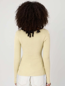 Back view of slim fit ribbed knit top in pale yellow showing detailed texture and cut
