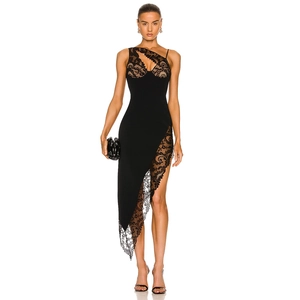 Detailed view of the intricate floral lace cutout and hem on this sexy black evening gown