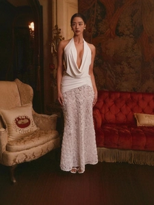 Elegant white backless maxi dress with halter neck and 3D floral lace mermaid skirt