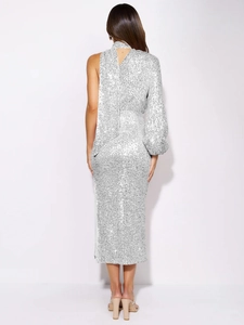 Detail of silver sequin evening dress showing asymmetric back view and one long sleeve