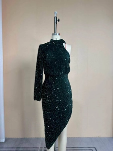 Detailed view of dark green sequin dress with asymmetrical shoulder and high neckline