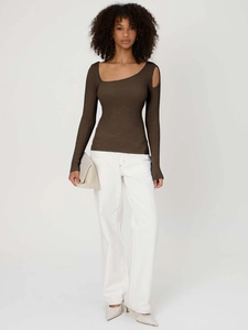 Detailed view of the dark brown ribbed knit fabric and asymmetric cut-out shoulder design