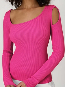 Detail of ribbed knit fabric on fuchsia slim-fit top with cut-out shoulder design