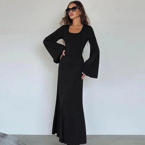 Detail showing the elegant bell sleeves and square neckline of a black maxi dress