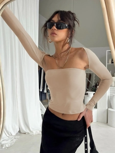 Detail of beige off-shoulder long-sleeve tube top set with elastic knit fabric