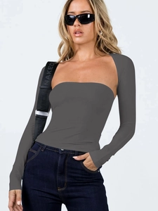 Close-up of dark grey two-piece set featuring a cropped long sleeve shrug and tube top