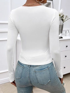 Slim fit white long sleeve top with a round neck shown from a rear back view perspective