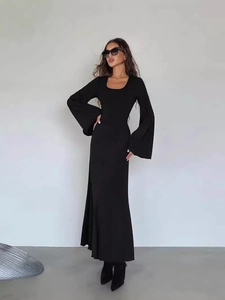Elegant black long sleeve maxi dress with bell sleeves and a stylish square neckline