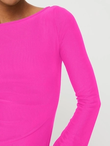 Detailed close-up of neon pink off-shoulder dress with ruffle sleeves and textured fabric