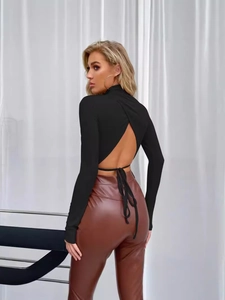 Chic black backless long sleeve top with tie detail and mock neck for women