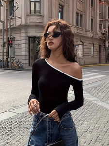 Slim fit black long sleeve top with asymmetric one-shoulder design and white piping