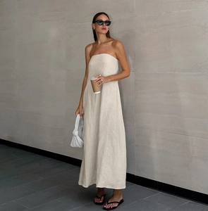 Chic beige cotton linen tube maxi dress with minimalist A-line silhouette for summer resort wear