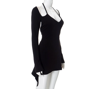 Detail view of black bodycon dress with cut-out shoulder and halter strap design