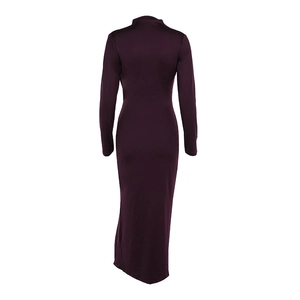 Detail of slim fit long sleeve dress with slit hem and textured knitting in dark purple