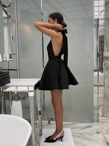 French sexy black halter backless mini dress with large bow knot and flared skirt