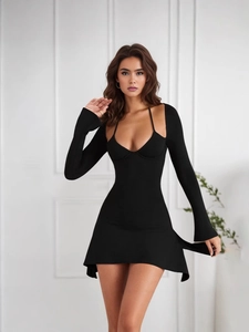 Sexy black bodycon dress with halter neckline and long sleeves in a slim fit silhouette