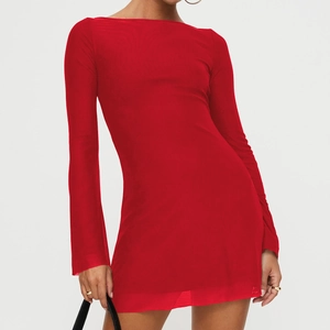 Detail of red off-shoulder mini dress featuring ruffled long sleeves and slim fit design