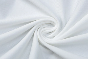 Macro detail of white high-elasticity knit fabric with fine ribbed texture and silk-like drape