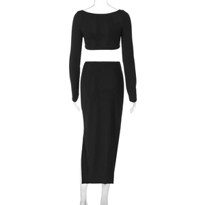Close-up of black bodycon skirt suit showing the deep U-neck back and crop top