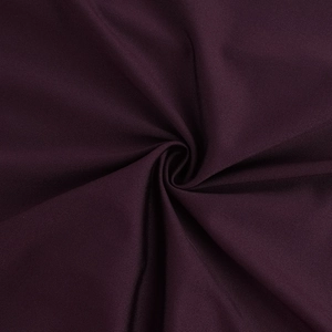 Detailed macro view of soft dark purple pleated fabric with subtle glossy finish