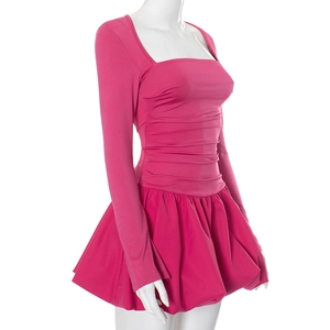 Detail of rose red mini dress with square neckline and ruched waist on a mannequin
