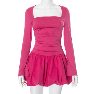Detail of rose red mini dress with square neck and ruched body on a white mannequin